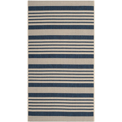 Arneshia Indoor/Outdoor Navy/Beige Striped Rug