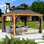 Pavillon de jardin à toit rigide Kozyard Apollo, structure en aluminium enduit de bois avec toit en acier galvanisé
