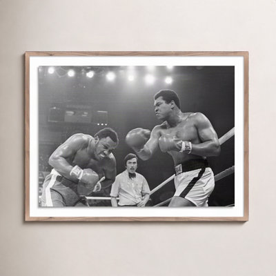 Adom "Muhammad Ali Punching Joe Frazier" Print