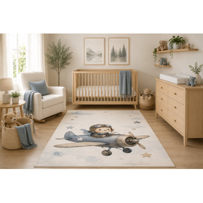Tapis « ultra-léger » 152 x 213 cm, motif petit aviateur aquarelle, garçon volant dans un avion vintage, idéal pour la chambre d'enfant ou la salle de jeux. Dos en silicone antidérapant. Tapis à poils courts.
