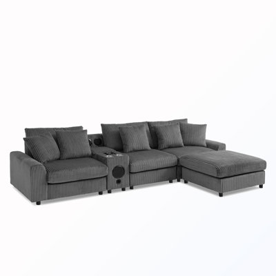 L-Shaped Upholstered Sectional Sofa with Bluetooth Speakers and Console and USB Charger and Ottoman