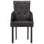 Fauteuil capitonné en cuir noir