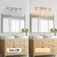 Applique murale verticale Kyneisha moderne chromée à 4 lumières en cristal, à placer au-dessus du miroir de la coiffeuse ou du lavabo ; compatible avec les ampoules à intensité variable (ampoules non comprises).-240086460-240086461