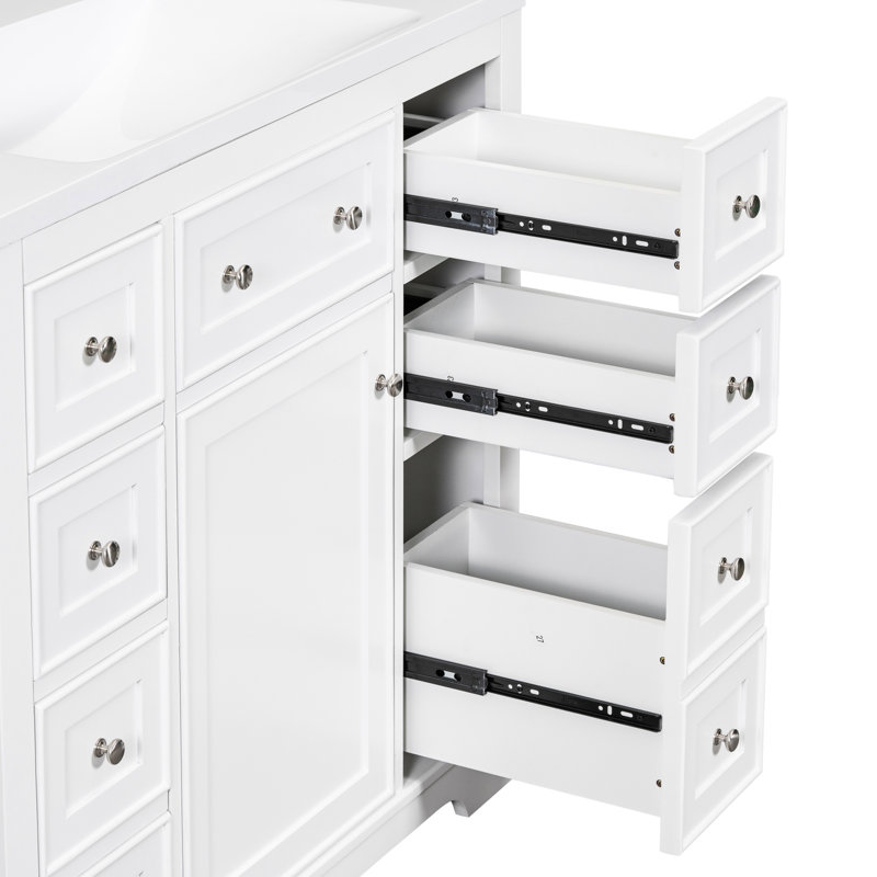 Meuble-lavabo 36 po - Base d'armoire blanche, 1 et 6 tiroirs, bois massif, finition moderne peinte, base à assembler requise. Tiroirs. Fabriqué en. Finition. Rangement. Panneaux de tiroirs amovibles. Facile