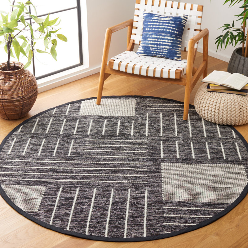 Flore Geometric Handmade Kilim Wool/Cotton Area Rug in Black/Ivory, Round 6'