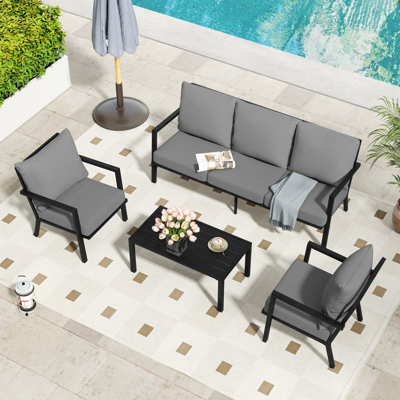 Ensemble de conversation d'extérieur en aluminium 4 pièces avec coussin gris, canapé et table basse Heim, Gris