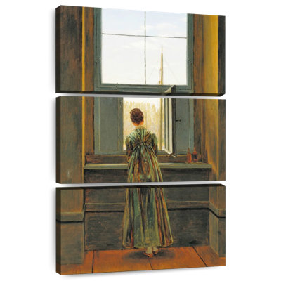 Femme à une fenêtre