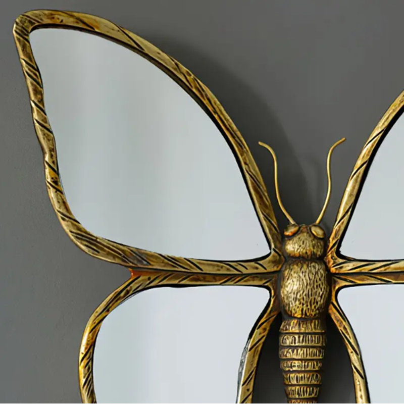 Miroir d'appoint en forme de papillon avec finition dorée