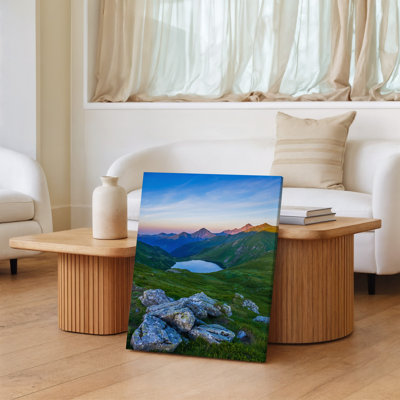 Canvas A Serene Mountain Landscape At Dawn Showcasing A Tranquil Lake Wall Art Nestled Between Rolling Green Hills The Foreground Canvas Wall Art