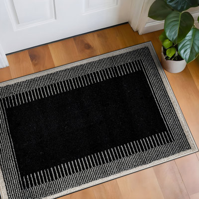 Tapis moderne à motif abstrait à bordure douce