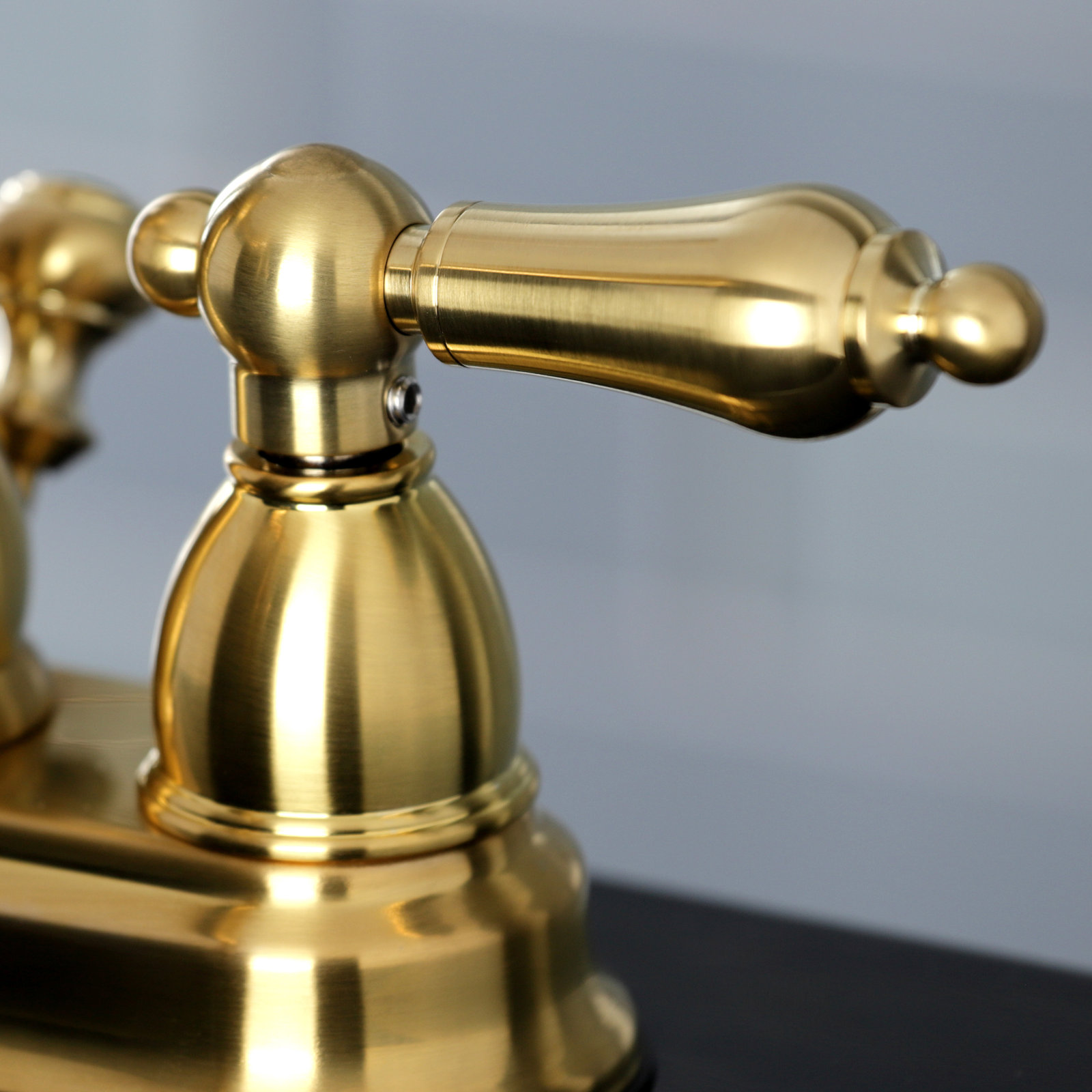 Kingston Brass Heritage Two-Handle 3-Hole Deck Mount 4" Centerset Bathroom Faucet with Plastic Pop-Up, Satin Brass