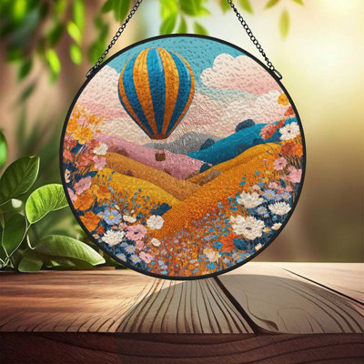 Montgolfière au-dessus de panneaux de vitrail, attrape-soleil pour la décoration de fenêtre