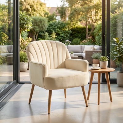 Fauteuil d'appoint rembourré en velours de luxe avec dossier incurvé et pieds en métal