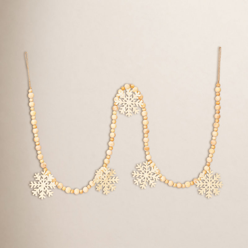 Ophelia & Co. 5' Ivory Felt Snowflake and Natural Wood Bead Garland.