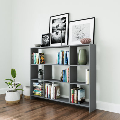 Komar 119.6cm H x 152.2cm W Standard Bookcase