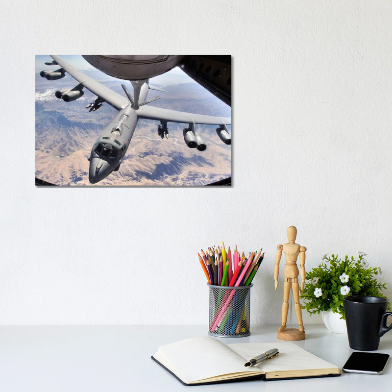 A B-52 Stratofortress Receives Fuel From A KC-135 Stratotanker Over Afghanistan by Stocktrek Images - Wrapped Canvas Print