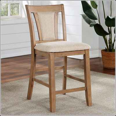 Chaise rembourrée en similicuir beige