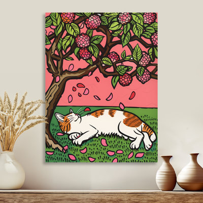 Chat dormant sous un arbre en fleurs de cerisier
