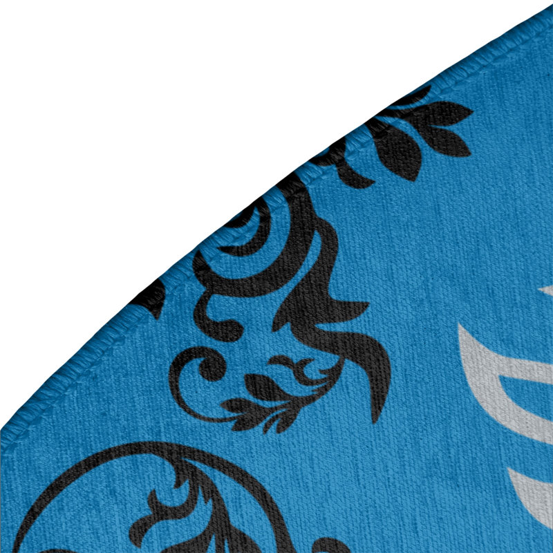 Tapis rond bleu damassé à motif baroque