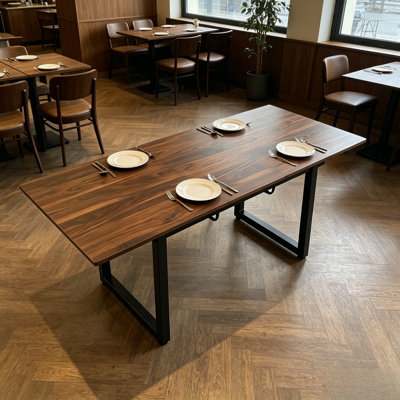 Table de salle à manger rectangulaire extensible en noyer, structure métallique robuste de style industriel, longueur ajustable, idéale pour les salles à manger, les bureaux à domicile et les espaces de travail.