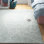 Aldonna Abstract Handmade Tufted Wool Teal Area Rug