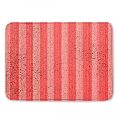 Tapis de bain rouge à rayures verticales
