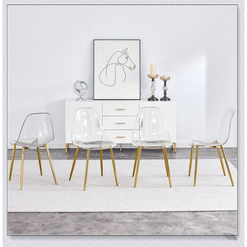 Ensemble de 4 chaises de salle à manger modernes et transparentes, de conception ergonomique et modernes avec pieds en métal plaqué or pour plus de confort et de style