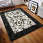 Tapis noir et blanc en patchwork de peau de vache 7,83 x 10 pi-1015229217