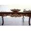 Table basse rectangulaire avec pieds incurvés de style traditionnel et structure en bois massif sculptée