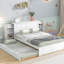 Lit plateforme double blanc avec 4 tablettes et lit gigogne simple - Fabrication en bois massif pour une chambre spacieuse avec rangement escamotable dans un environnement serein