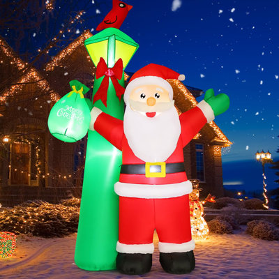 GOOSH 8 FT Christmas Inflatable Santa Claus Standing under Green Lighthouse with LED Lights