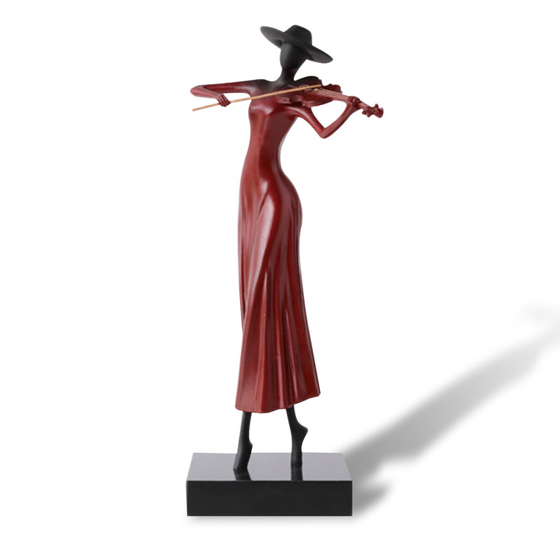Objet décoratif en métal en forme de femme rouge avec marbre