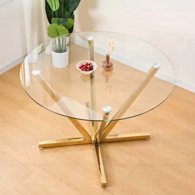 Table de salle à manger ronde en verre trempé avec pieds en métal doré, facile à assembler pour les cuisines et les salons modernes