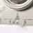 Kingston Brass Templeton Two-Handle 3-Hole Deck Mount Widespread Bathroom Faucet with Brass Pop-Up Drain-12624291
