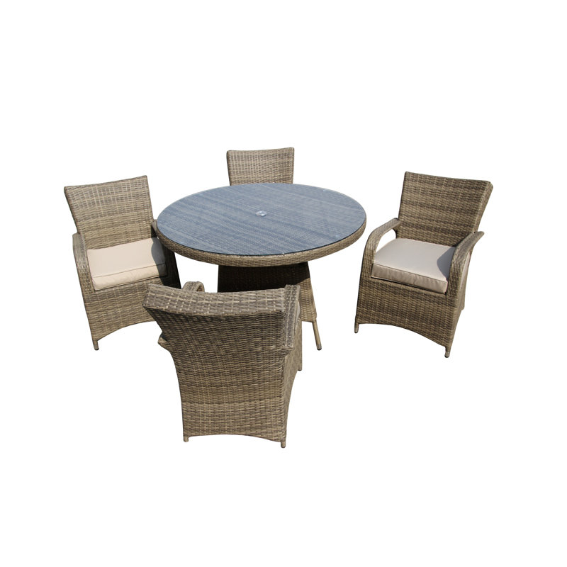 Judesa 4 - Person Wicker Patio Dining Set with Round Table , Cushions Included, Nature, Nature