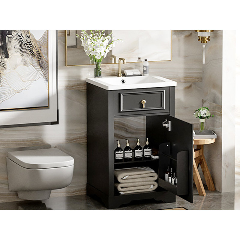 Meuble-lavabo de 20 pouces avec lavabo en céramique. Compact et élégant. Protection contre le débordement. Étagère réglable à fixation sur porte. Finition noire. Évier de construction, porte à fermeture en douceur, rangement pour un espace serein