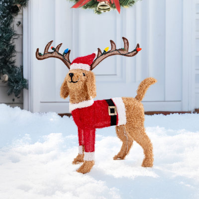 Premium AI Image | Christmas french bulldog in santa hat wrapped in