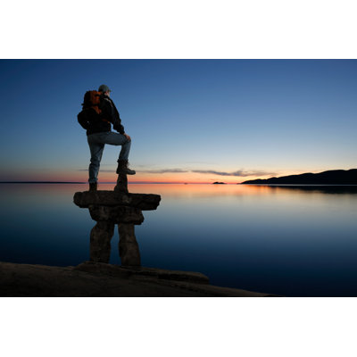 «Man with Inukshuk» par Sharately_Done