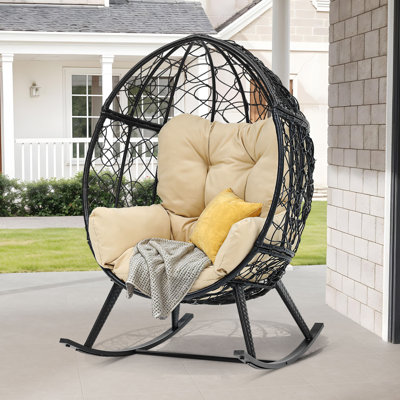 Chaise berçante d'extérieur en osier Malakai