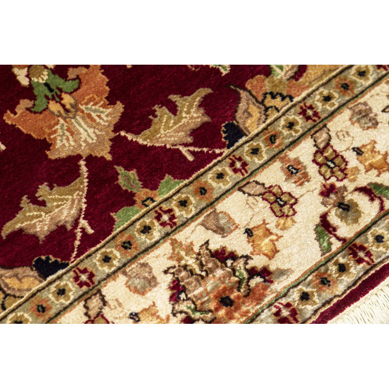 Tapis rouge et ivoire noué à la main de haute qualité