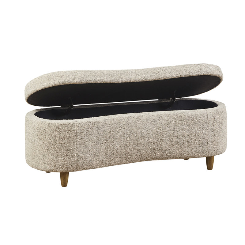 Banc de rangement spacieux à dessus rabattable en tissu texturé et fabrication en bois massif de couleur taupe à côté incurvé