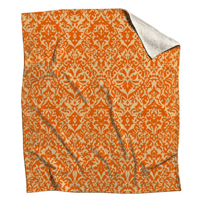 Couvertures orange à motif damassé