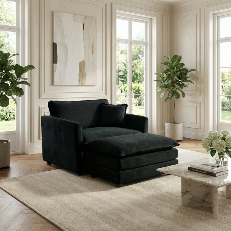 Fauteuil club noir à assise simple avec repose-pieds en chenille noire, décor moderne pour la lecture de salon et de chambre à coucher