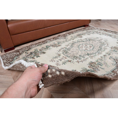 Tapis turc antique beige avec motif floral Oushak idéal pour rehausser l'esthétique de votre salle à manger