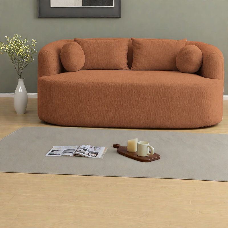 Canapé compact en chenille orange, décor de salon moderne pour les petits espaces