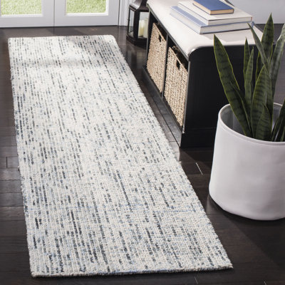 Tapis bleu / gris anthracite en laine touffeté à la main