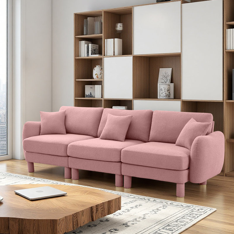 Canapé à 3 places en tissu Boucle avec accoudoirs distinctifs en forme de coquillage, pieds cylindriques enveloppés de tissu d'ameublement