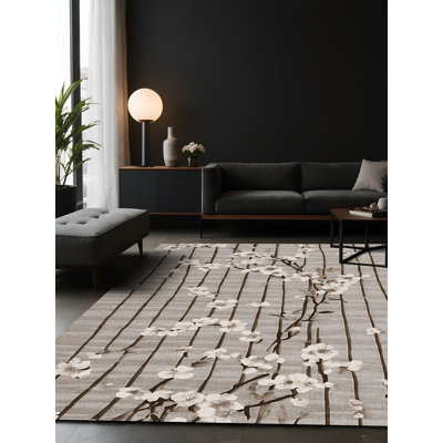 Tapis gris soyeux et moelleux