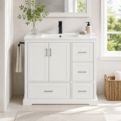 Meuble-lavabo de salle de bain avec lavabo en céramique, 4 tiroirs et portes à fermeture en douceur