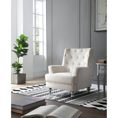 Élégant fauteuil ivoire pour espaces confortables